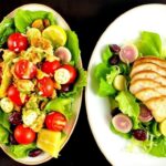 Два салата, два настроения: как приготовить Оливье и Цезарь с курицей так, чтобы гости просили добавки